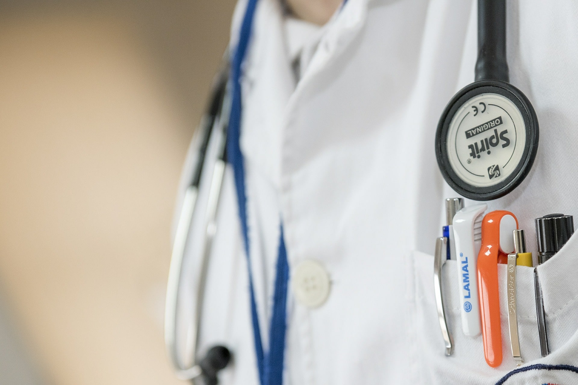 close up of white coat with stethoscope