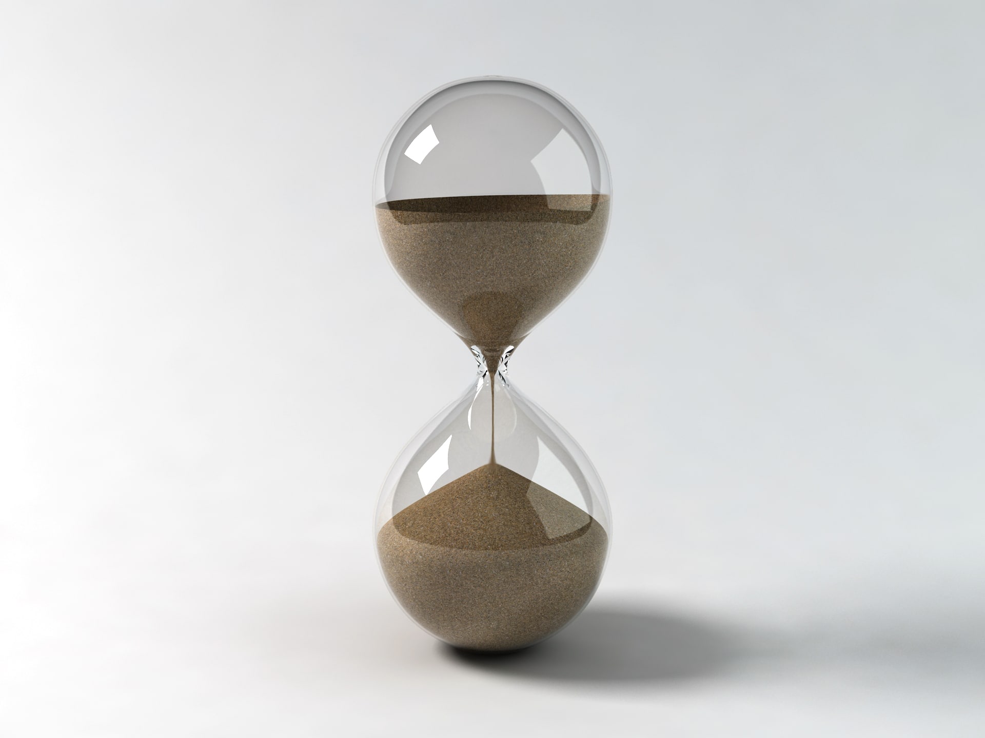 hourglass with sand to represent time passing