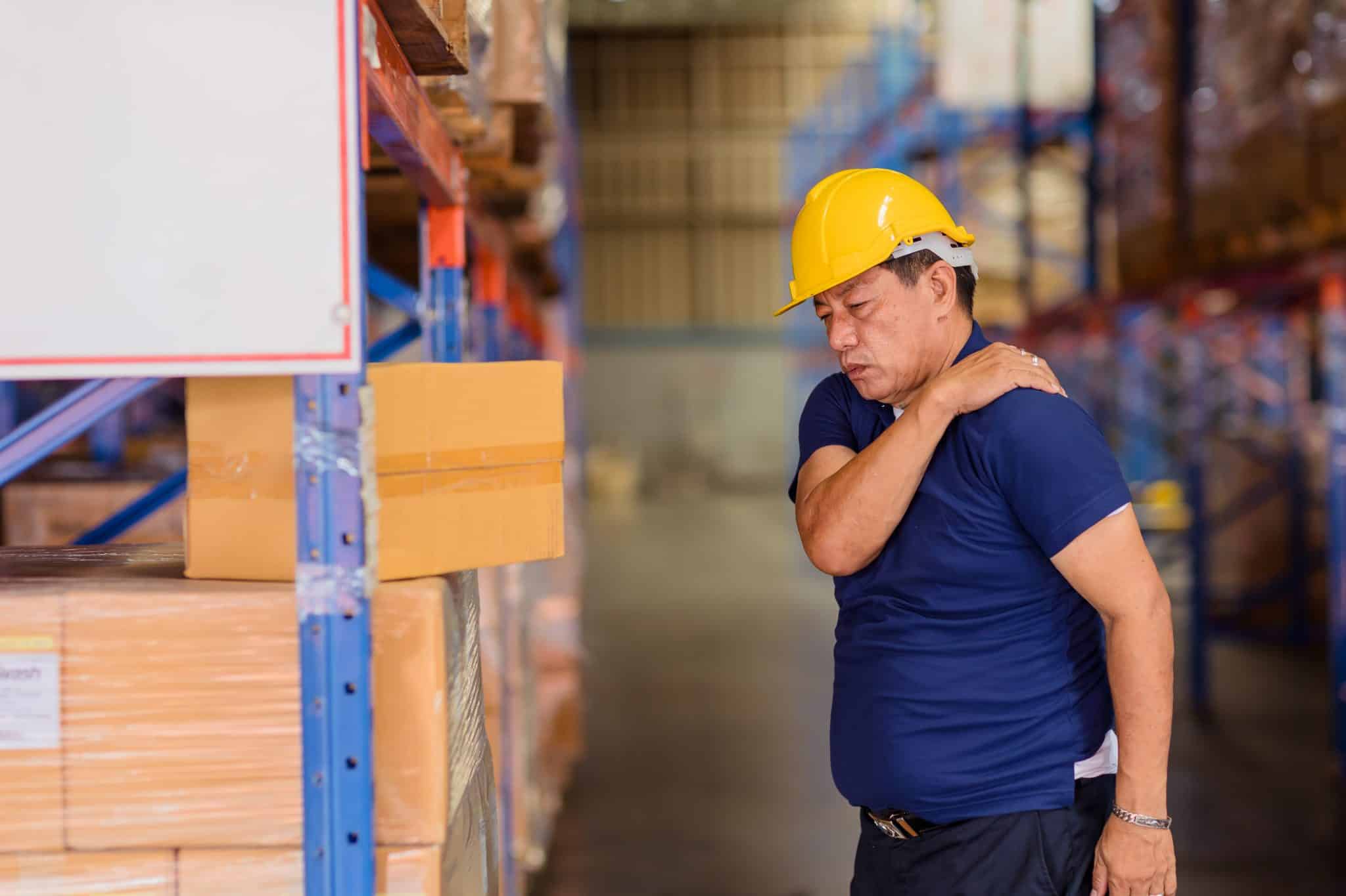 warehouse worker with shoulder injury